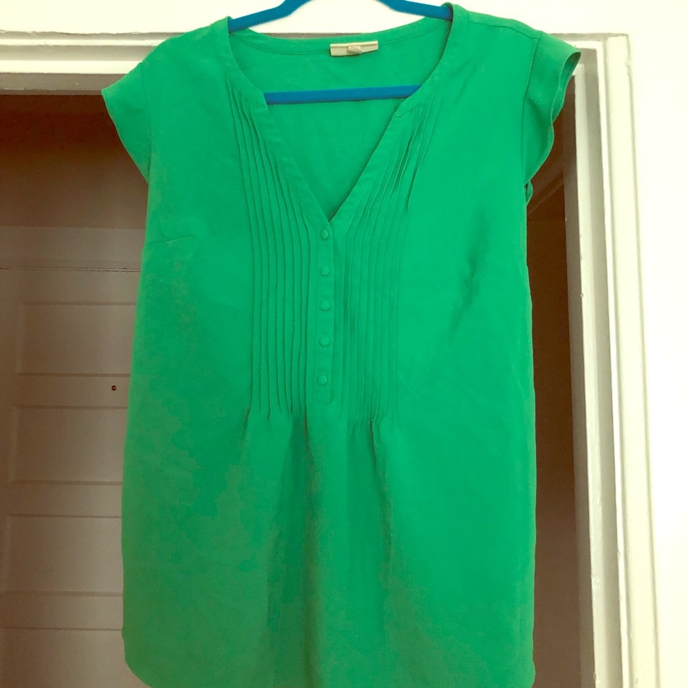Green, sleeveless blouse